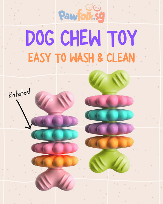 Dog chew toy rotating element dog bone